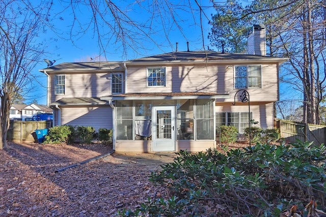 view of front of property featuring a sunroom