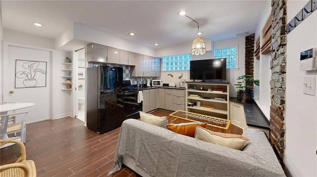 living room with dark hardwood / wood-style floors