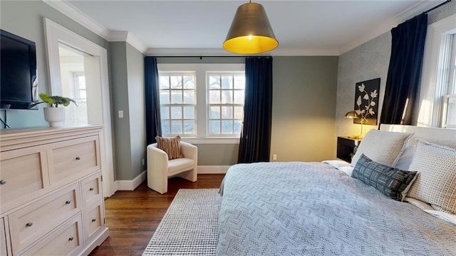 bedroom with crown molding and dark hardwood / wood-style flooring