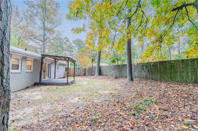 view of yard featuring a deck