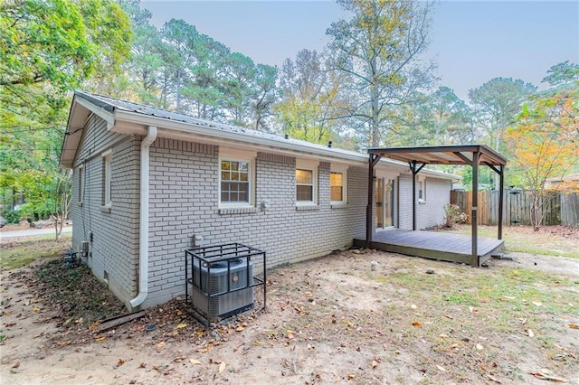 rear view of property with a deck