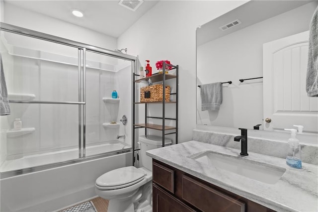 507 Bishop Ln, Woodstock, GA 30188 - full bathroom featuring toilet, vanity, and bath / shower combo with glass door