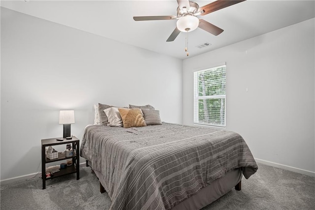 507 Bishop Ln, Woodstock, GA 30188 - carpeted bedroom featuring baseboards and ceiling fan