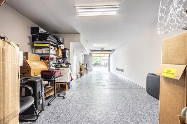 garage with baseboards