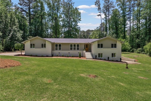 145 Devilla Trce, Fayetteville, GA 30214 - view of front of house with a front yard