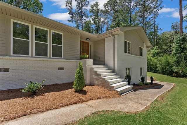 145 Devilla Trce, Fayetteville, GA 30214 - view of front of house with brick siding and a front yard