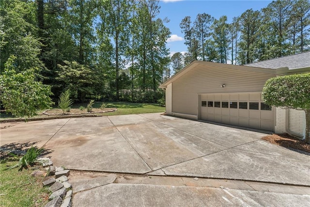 145 Devilla Trce, Fayetteville, GA 30214 - garage featuring driveway
