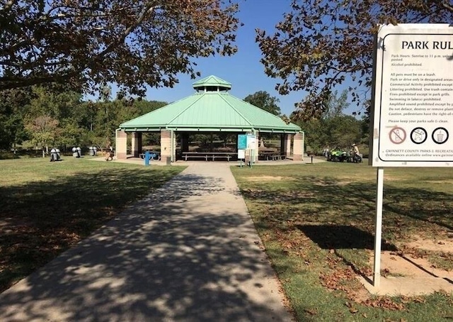 view of home's community with a yard and a gazebo