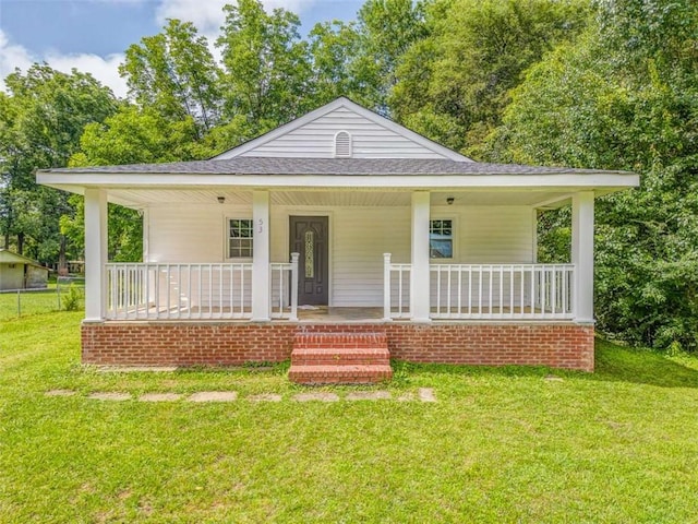 53 Knight Dr, Cedartown, GA 30125 - view of front facade featuring a porch, a front yard, and a shingled roof
