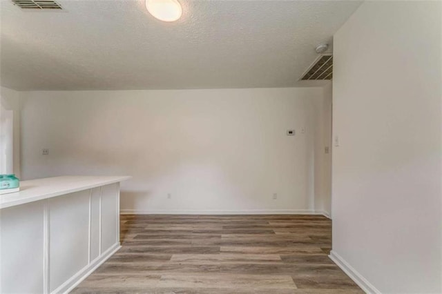 53 Knight Dr, Cedartown, GA 30125 - empty room featuring a textured ceiling and wood finished floors