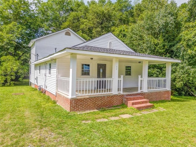 53 Knight Dr, Cedartown, GA 30125 - view of front of property featuring a shingled roof, covered porch, a front lawn, and view of scattered trees