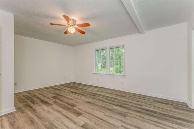 53 Knight Dr, Cedartown, GA 30125 - empty room featuring a textured ceiling, a ceiling fan, and wood finished floors