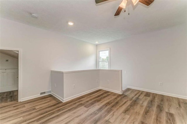 53 Knight Dr, Cedartown, GA 30125 - spare room featuring wood finished floors, ceiling fan, recessed lighting, a textured ceiling, and a smoke detector