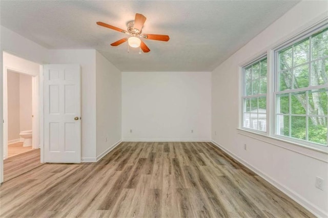 53 Knight Dr, Cedartown, GA 30125 - unfurnished room featuring wood finished floors, a textured ceiling, and ceiling fan