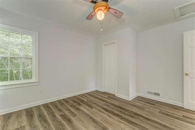 53 Knight Dr, Cedartown, GA 30125 - spare room with wood finished floors, attic access, and a ceiling fan