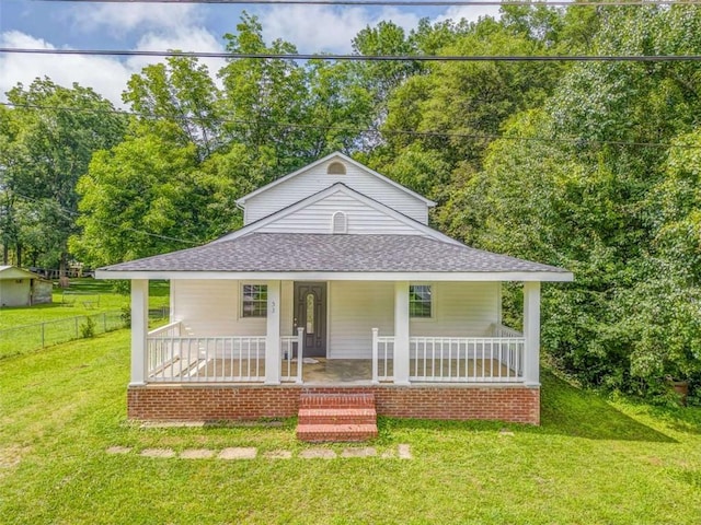 53 Knight Dr, Cedartown, GA 30125 - view of front of house featuring roof with shingles, a porch, and view of wooded area