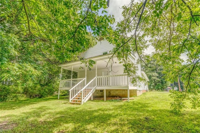 53 Knight Dr, Cedartown, GA 30125 - view of grassy yard with stairway and a porch