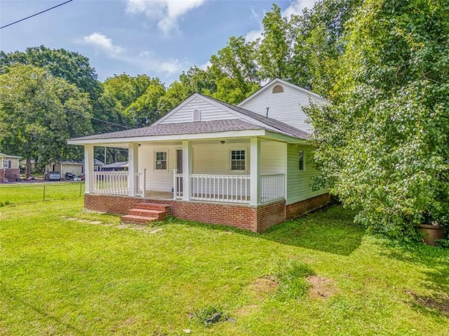 53 Knight Dr, Cedartown, GA 30125 - bungalow-style house featuring a porch, a front lawn, and a shingled roof