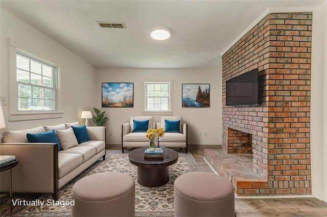 53 Knight Dr, Cedartown, GA 30125 - living room featuring wood finished floors and a fireplace