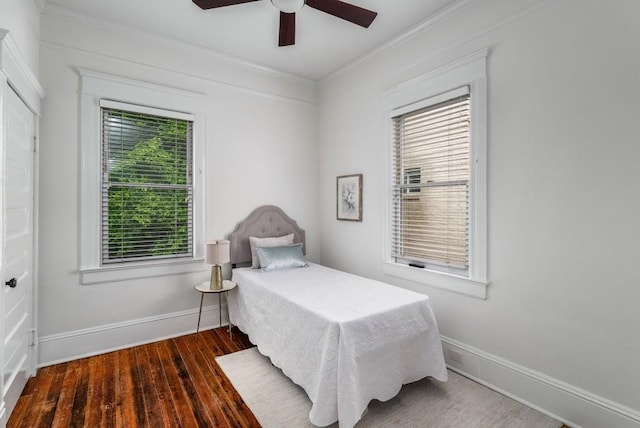 1038 Saint Charles Ave, Atlanta, GA 30306 - bedroom with crown molding, wood finished floors, baseboards, and a ceiling fan