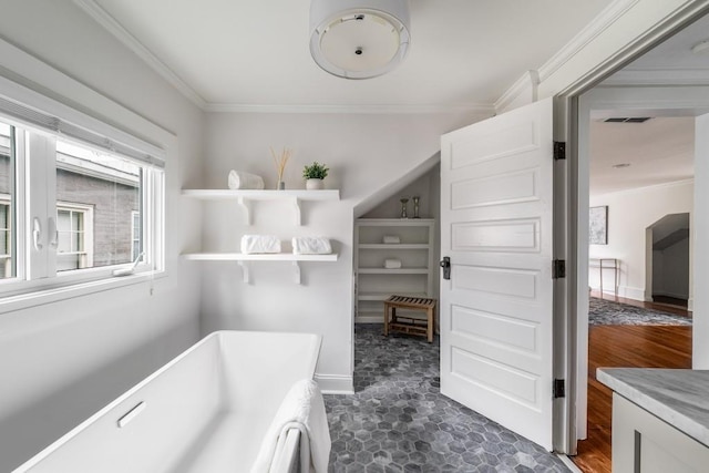 1038 Saint Charles Ave, Atlanta, GA 30306 - bathroom with ornamental molding and a soaking tub
