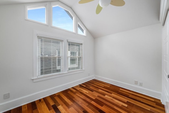 1038 Saint Charles Ave, Atlanta, GA 30306 - empty room with lofted ceiling, a ceiling fan, baseboards, and dark wood-type flooring