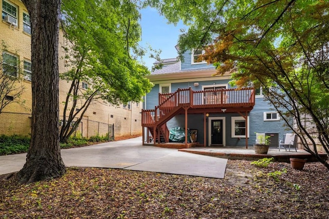 1038 Saint Charles Ave, Atlanta, GA 30306 - rear view of property featuring a wooden deck, stairway, a patio area, and cooling unit