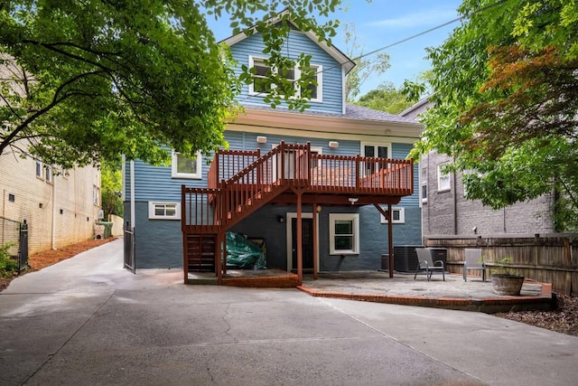 1038 Saint Charles Ave, Atlanta, GA 30306 - rear view of house featuring a patio area, a wooden deck, and stairs