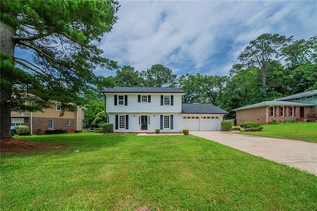 4732 Manly Ct, Stone Mountain, GA 30088 - view of front facade with an attached garage, concrete driveway, and a front yard
