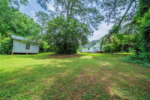 4732 Manly Ct, Stone Mountain, GA 30088 - view of green lawn featuring an outbuilding