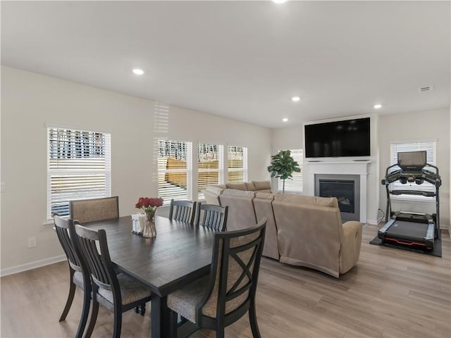 dining room with light hardwood / wood-style floors