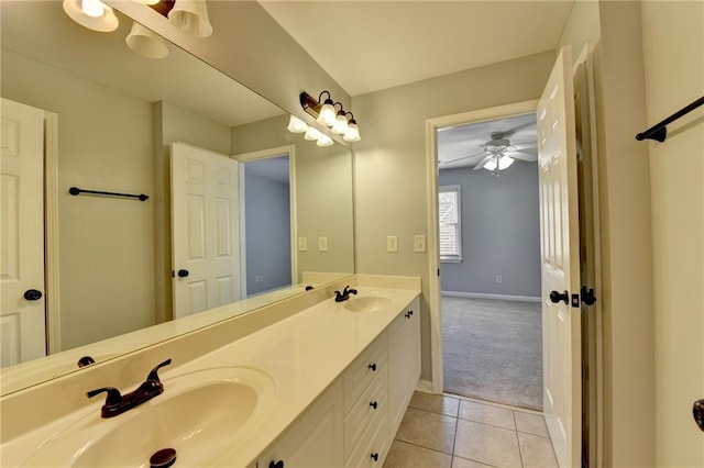 bathroom featuring ceiling fan, tile patterned flooring, and vanity