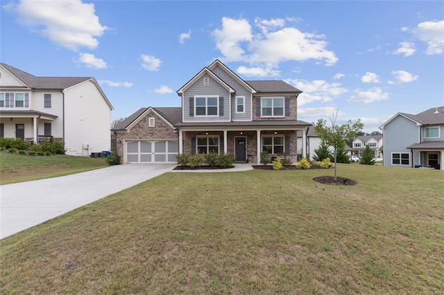 craftsman-style home with a porch, a garage, and a front lawn