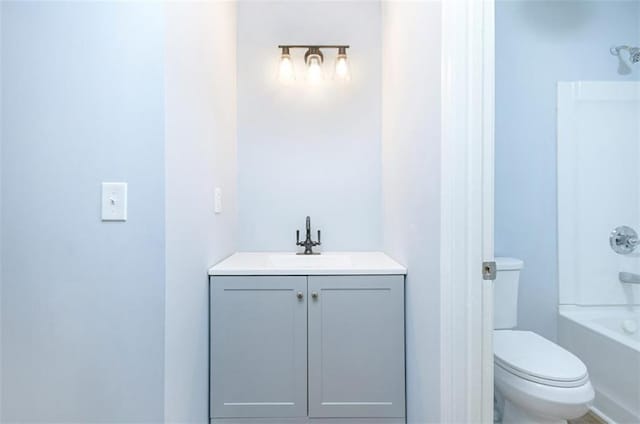 full bathroom with vanity, toilet, and bathing tub / shower combination