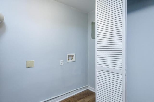 washroom with washer hookup and hardwood / wood-style flooring