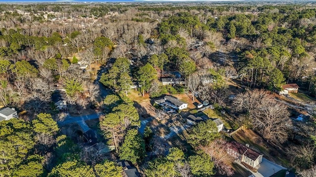 aerial view featuring a view of trees