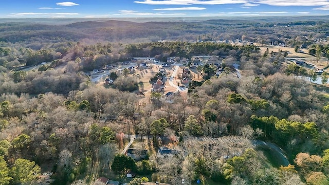 drone / aerial view with a view of trees