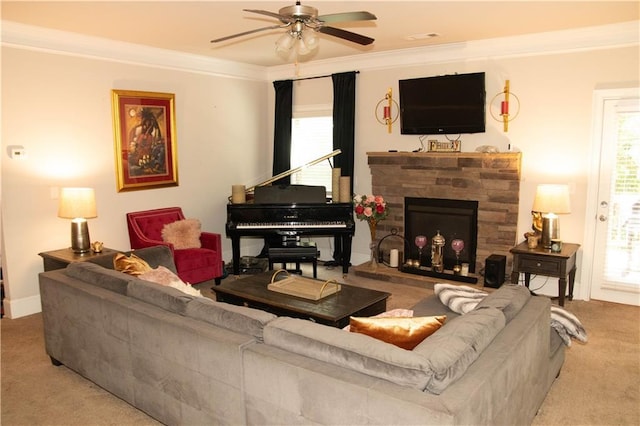 305 Anise Ct, Mcdonough, GA 30252 - carpeted living area with ceiling fan, crown molding, and a stone fireplace