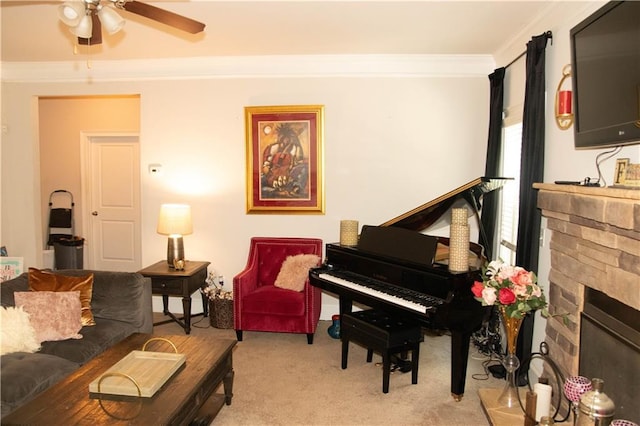 305 Anise Ct, Mcdonough, GA 30252 - living area featuring crown molding, ceiling fan, carpet flooring, and a fireplace