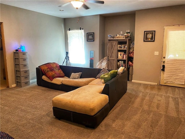 305 Anise Ct, Mcdonough, GA 30252 - living room featuring baseboards, ceiling fan, and carpet floors