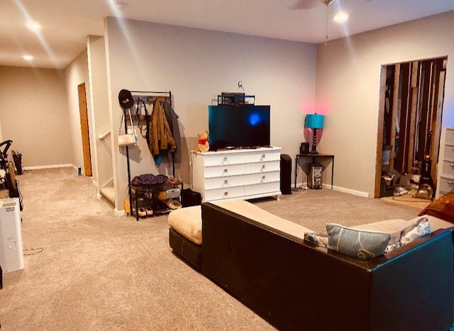 305 Anise Ct, Mcdonough, GA 30252 - carpeted living area with baseboards and ceiling fan