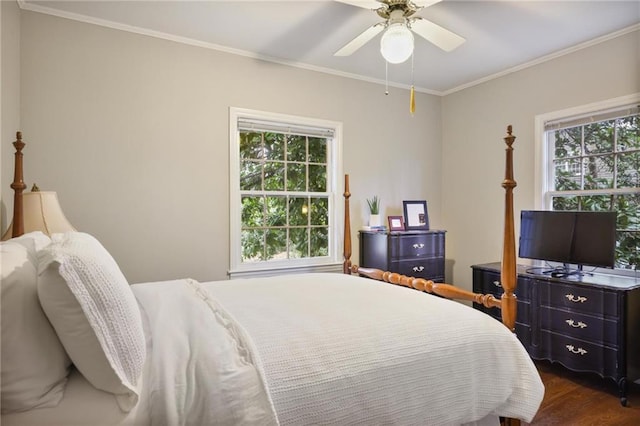 bedroom with ceiling fan, crown molding, and dark hardwood / wood-style floors