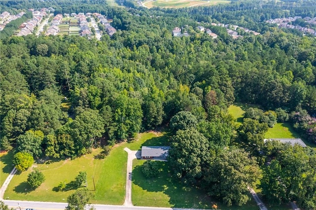 aerial view with a wooded view