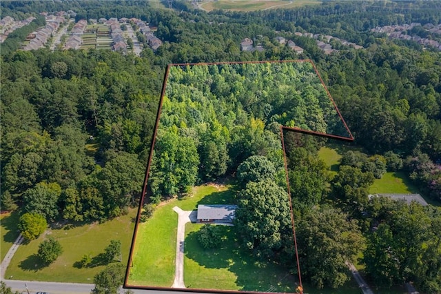 bird's eye view featuring a view of trees