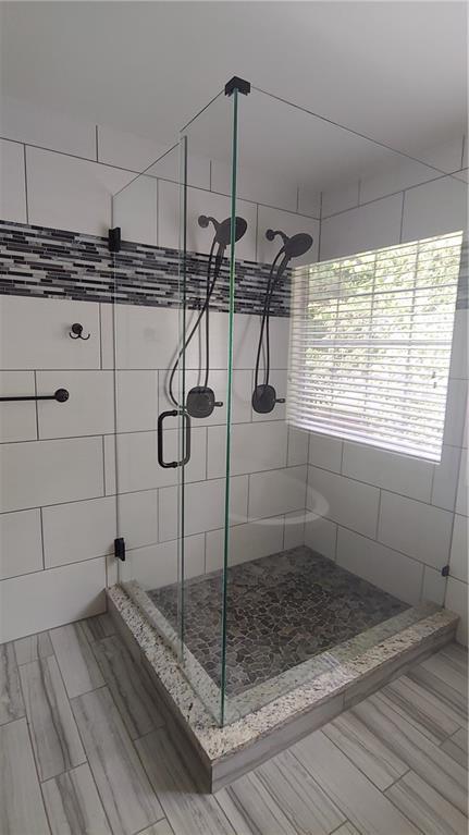 2477 Briar Valley Way, Dacula, GA 30019 - bathroom with a shower stall