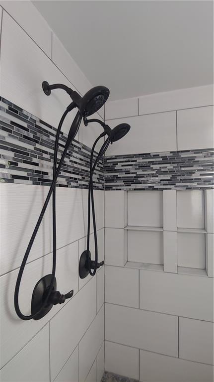 2477 Briar Valley Way, Dacula, GA 30019 - details with tiled shower