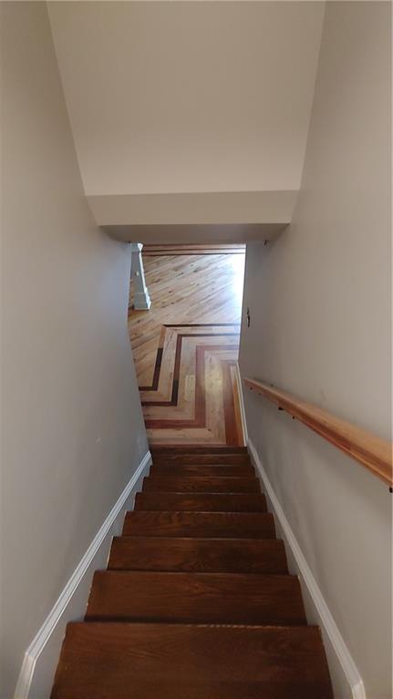 2477 Briar Valley Way, Dacula, GA 30019 - stairway featuring baseboards