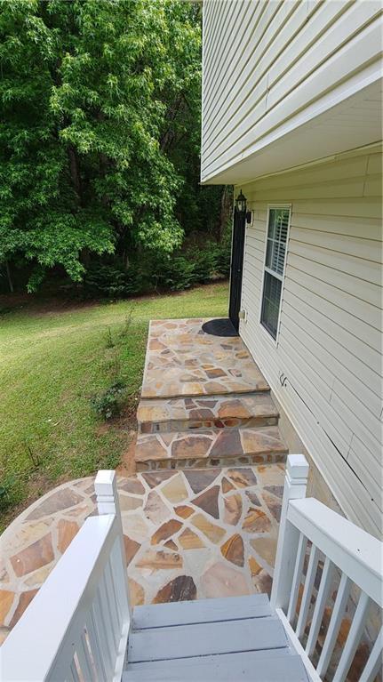 2477 Briar Valley Way, Dacula, GA 30019 - view of patio / terrace