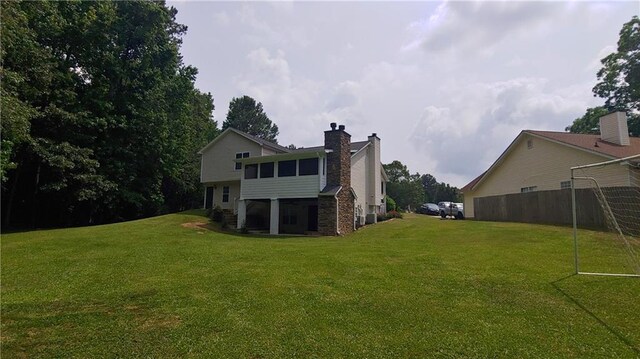2477 Briar Valley Way, Dacula, GA 30019 - back of property with a chimney