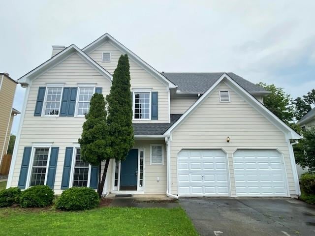 690 Kimball Parc Way, Alpharetta, GA 30022 - traditional-style home featuring asphalt driveway, roof with shingles, a front yard, and an attached garage